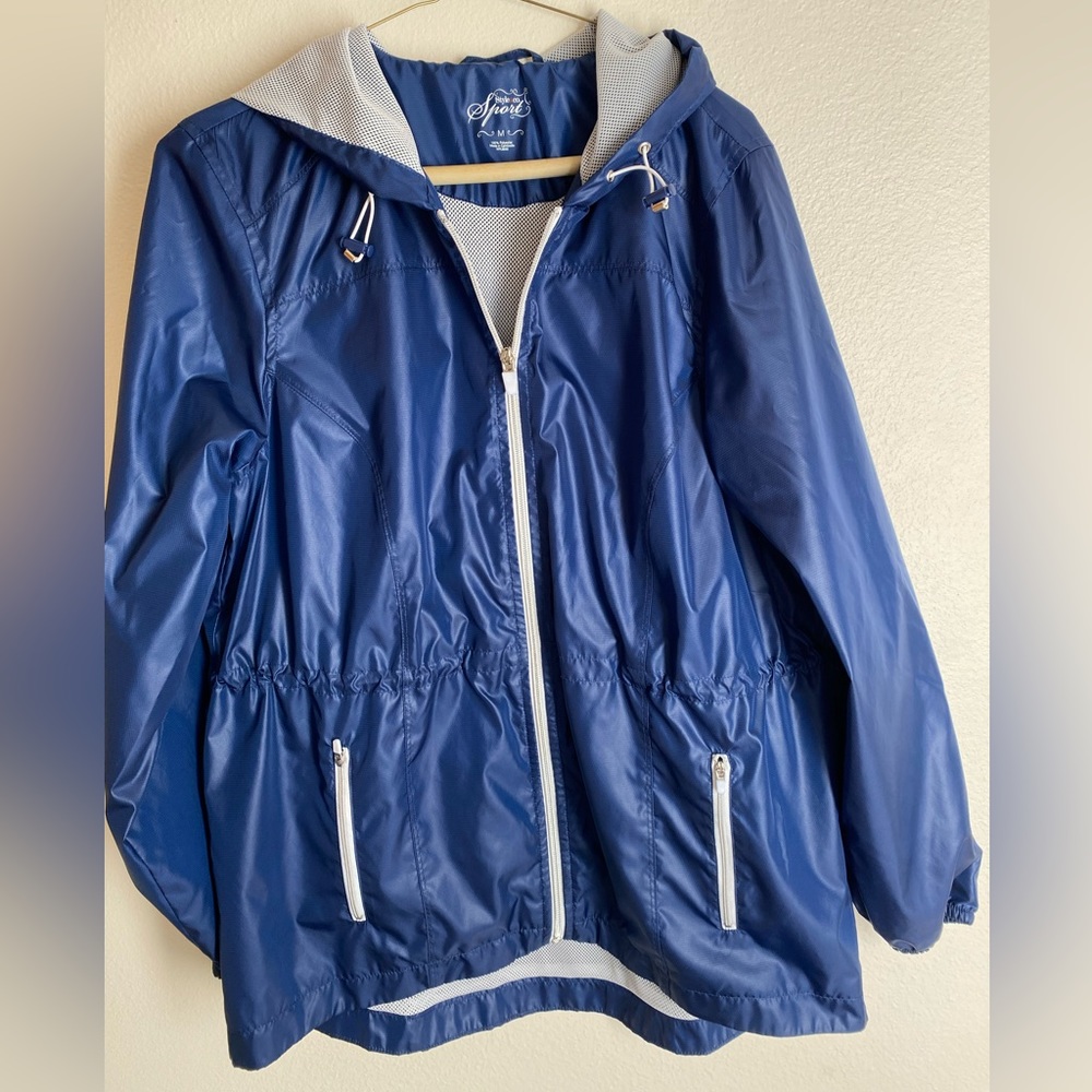 Ladies blue medium rain jacket.